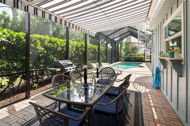 view of patio / terrace with an outdoor pool, outdoor dining area, a lanai, and grilling area