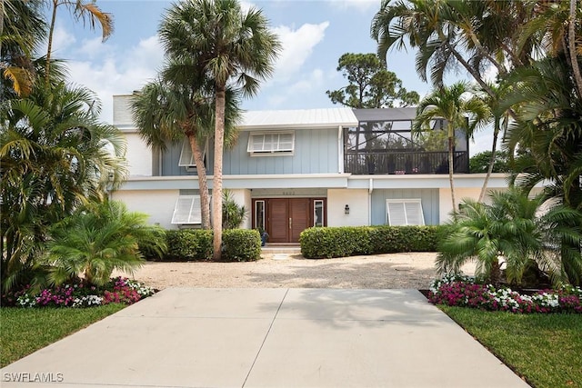 view of front of property with a lanai