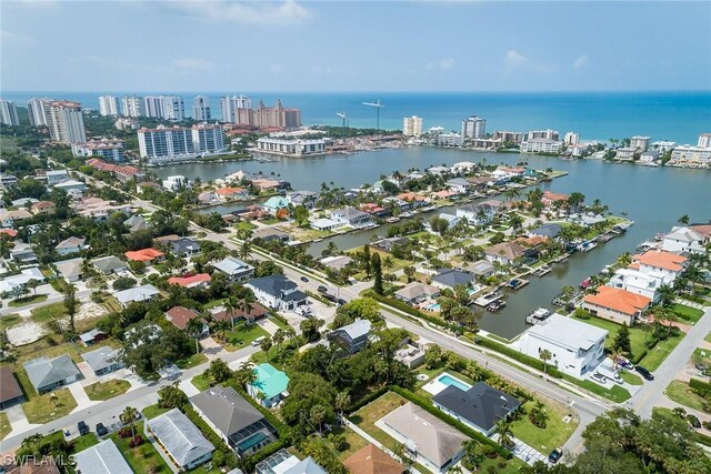 aerial view with a view of city and a water view