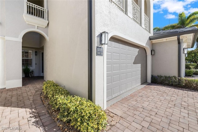 exterior space with a garage