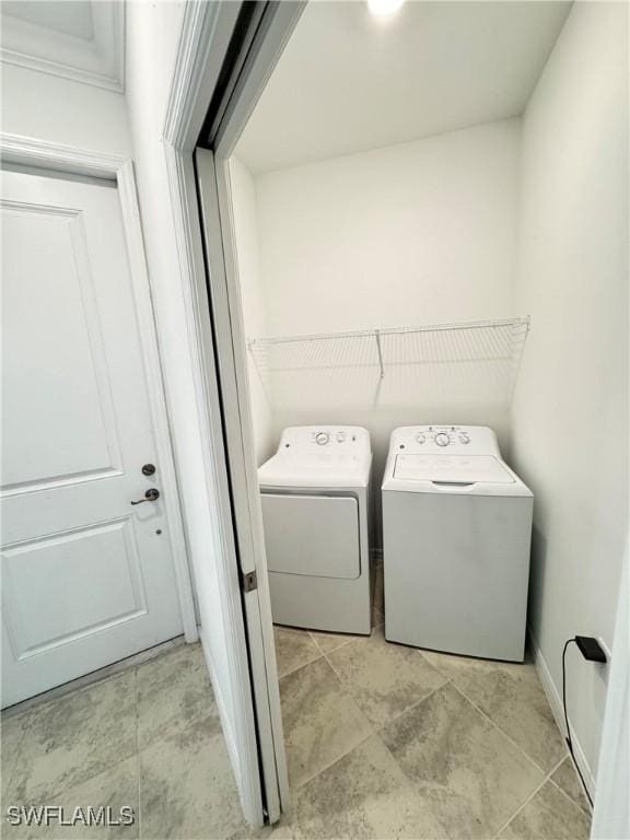 laundry area featuring washing machine and dryer