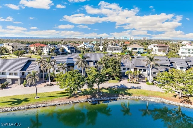 aerial view featuring a water view