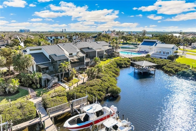 birds eye view of property featuring a water view