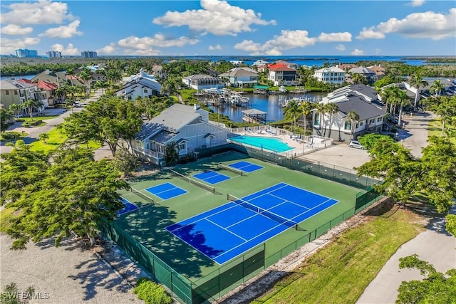 bird's eye view with a water view