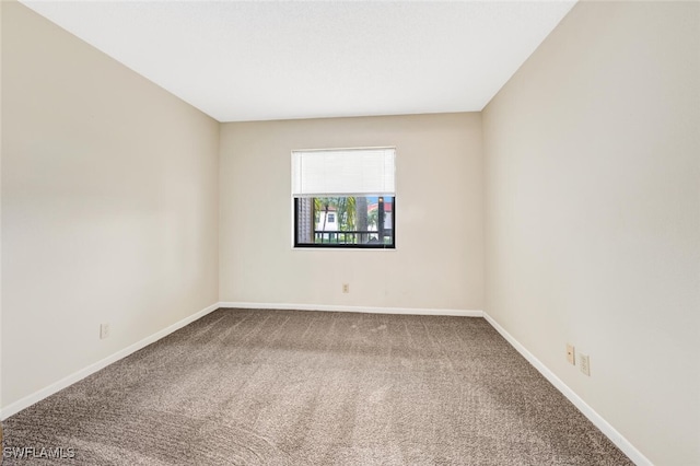 view of carpeted spare room