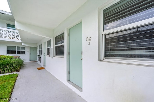 532 4th Ave S Unit 2, Naples, FL 34102 - view of exterior entry with stucco siding