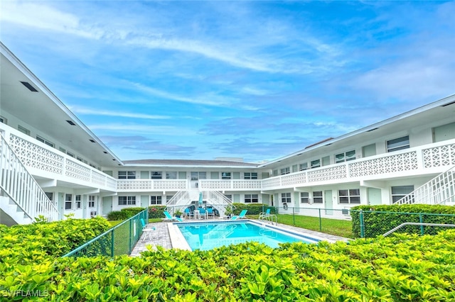 532 4th Ave S Unit 2, Naples, FL 34102 - view of swimming pool with stairs