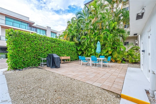 532 4th Ave S Unit 2, Naples, FL 34102 - view of patio / terrace with area for grilling and outdoor dining space