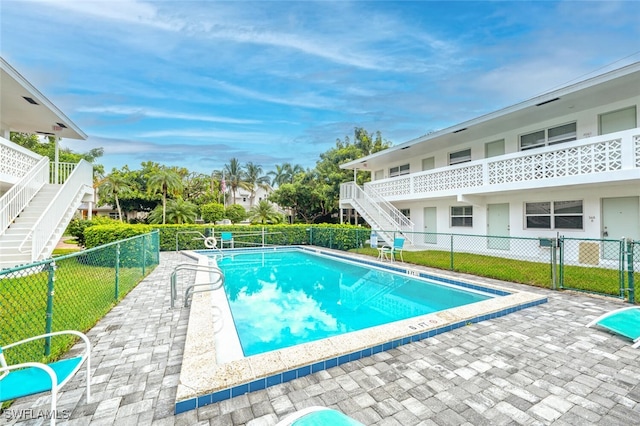 532 4th Ave S Unit 2, Naples, FL 34102 - community pool with stairs and a patio area