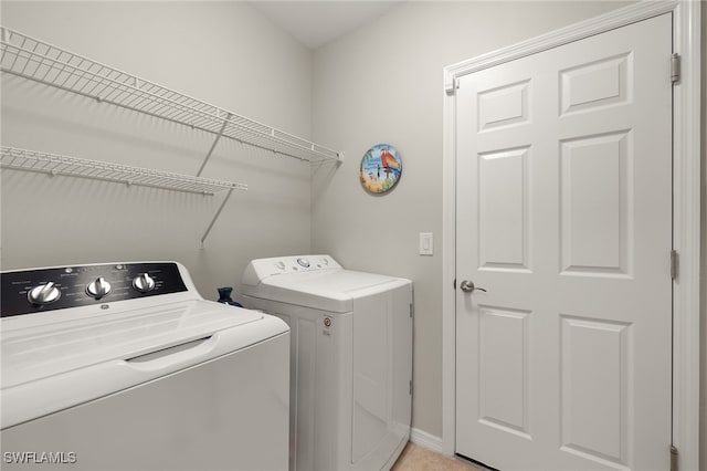 laundry area featuring independent washer and dryer