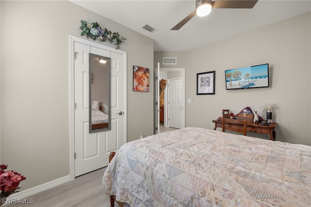 bedroom featuring ceiling fan and light hardwood / wood-style floors