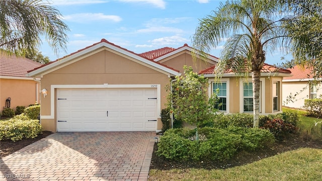 view of front of home with a garage