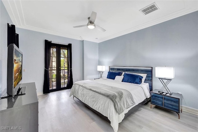 bedroom featuring access to exterior, ceiling fan, french doors, and light wood-type flooring