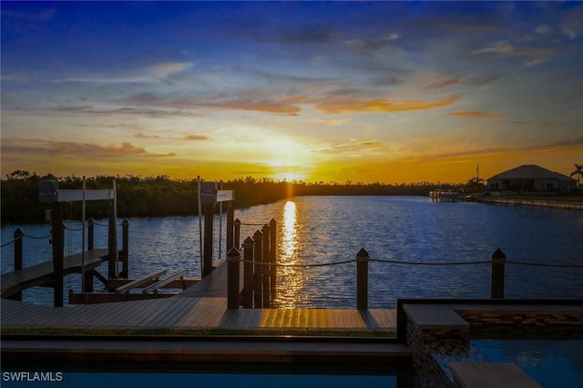 dock area featuring a water view