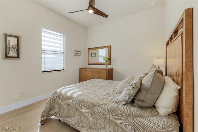 bedroom featuring ceiling fan and light wood-type flooring