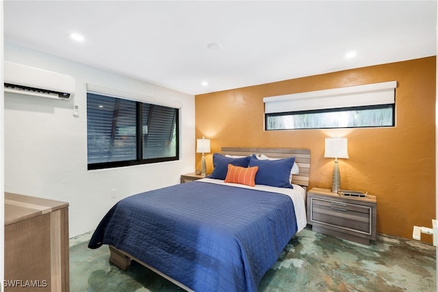 bedroom featuring a wall unit AC