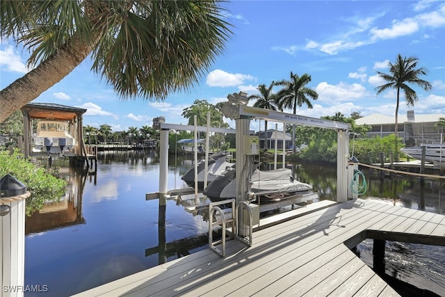 view of dock with a water view