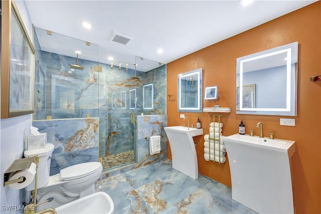 bathroom with a bidet, toilet, and walk in shower