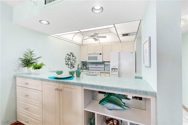 kitchen with ceiling fan and white appliances