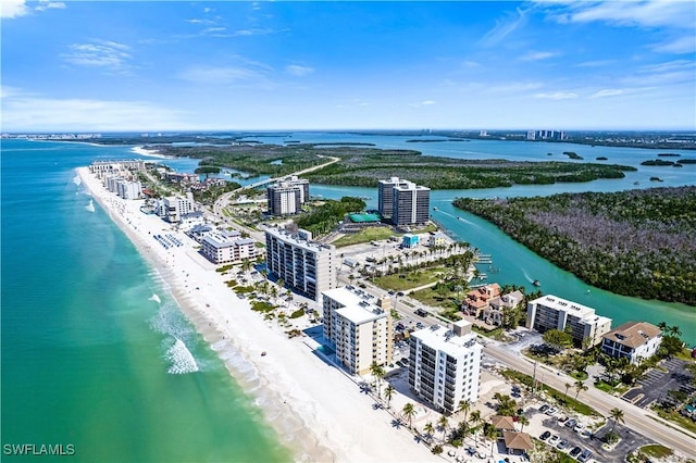 bird's eye view featuring a beach view and a water view