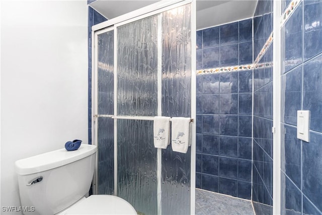 26340 Hickory Blvd Unit 703, Bonita Springs, FL 34134 - bathroom with tiled shower and toilet