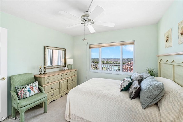 26340 Hickory Blvd Unit 703, Bonita Springs, FL 34134 - bedroom featuring light colored carpet and ceiling fan