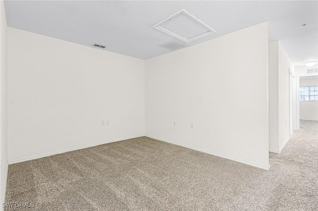 spare room featuring carpet floors