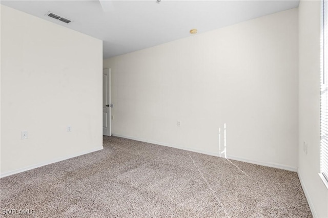 view of carpeted spare room