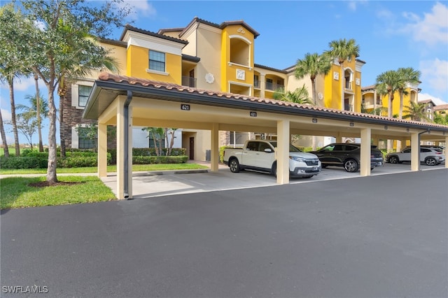 view of car parking featuring a carport