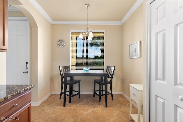 dining room featuring crown molding, an inviting chandelier, and light tile patterned floors