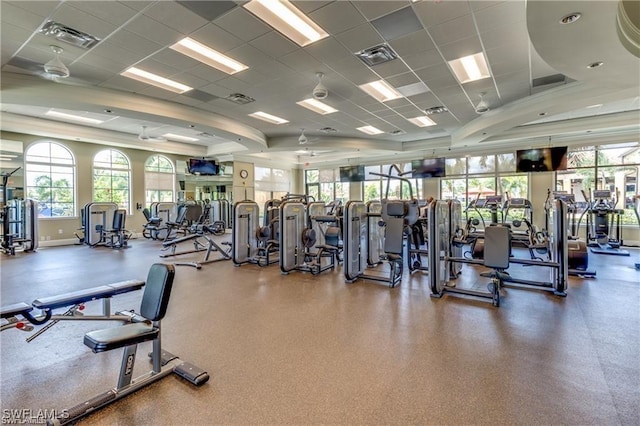 exercise room with a drop ceiling