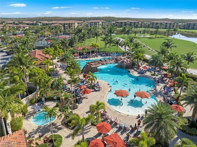 bird's eye view with a water view