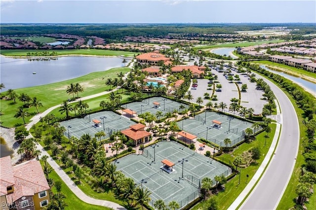 drone / aerial view with a water view