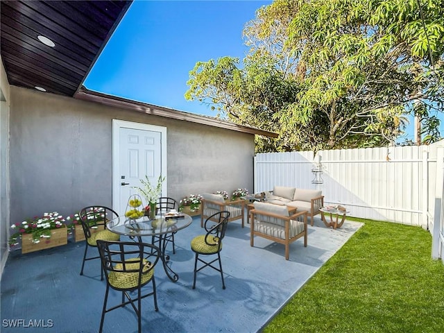 view of patio with an outdoor living space