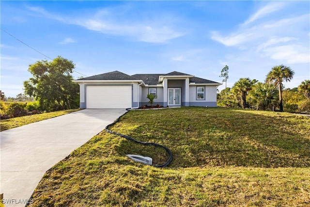 ranch-style house with a garage and a front lawn