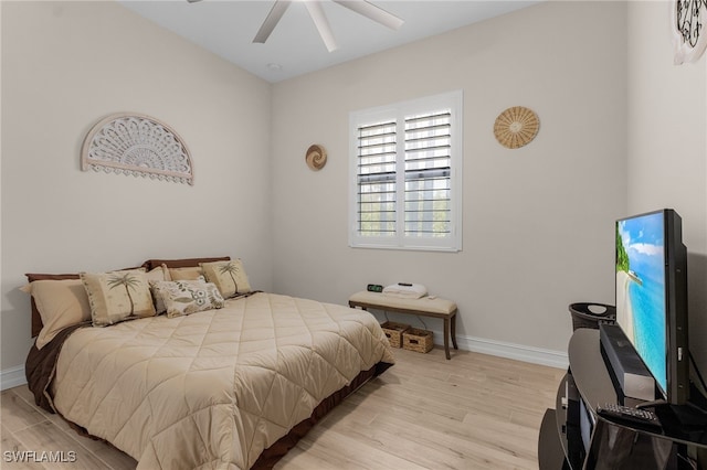 bedroom featuring ceiling fan and light hardwood / wood-style flooring