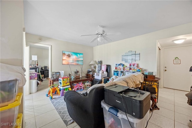 living room featuring ceiling fan and light tile patterned flooring