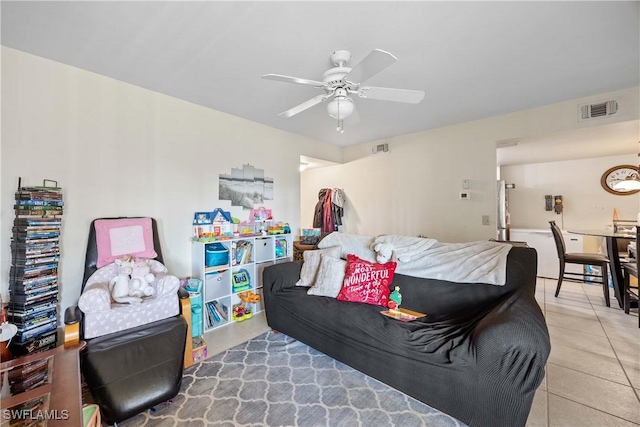 bedroom featuring tile patterned floors and ceiling fan