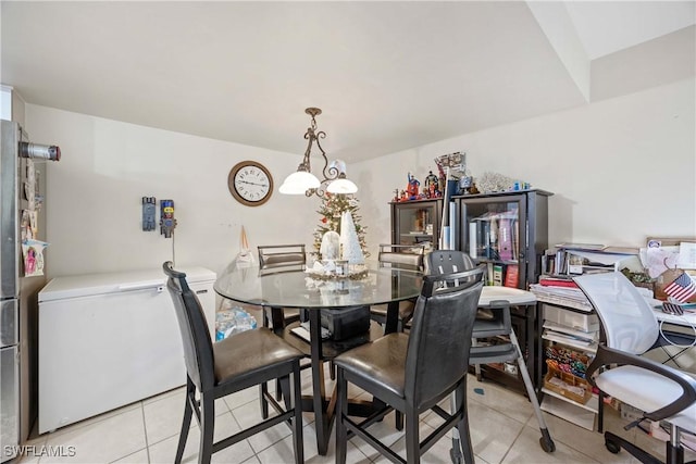 view of tiled dining space