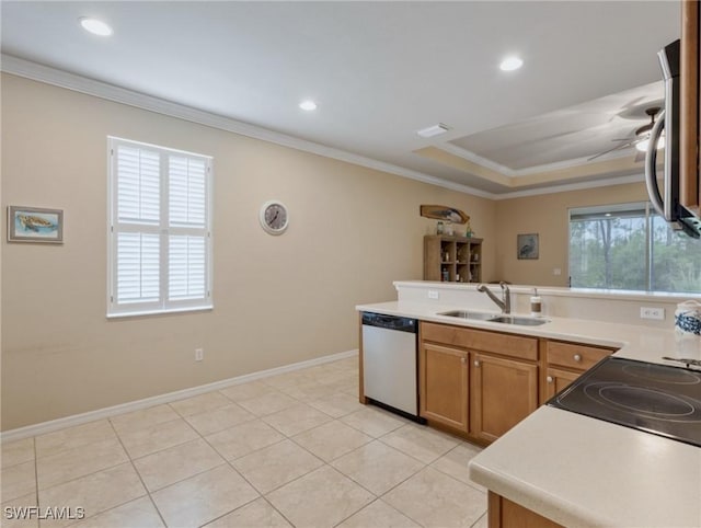 kitchen with dishwasher, crown molding, plenty of natural light, and sink