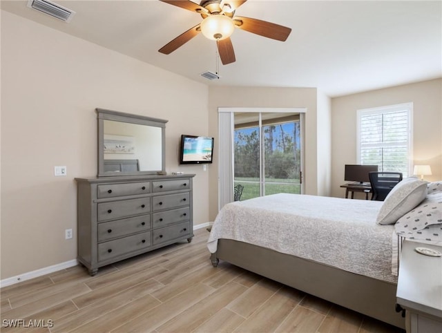 bedroom with access to outside, ceiling fan, and light hardwood / wood-style floors