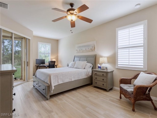 bedroom featuring access to exterior, light wood-type flooring, and ceiling fan