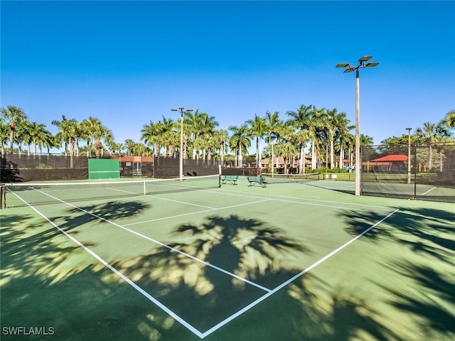 view of tennis court with basketball court