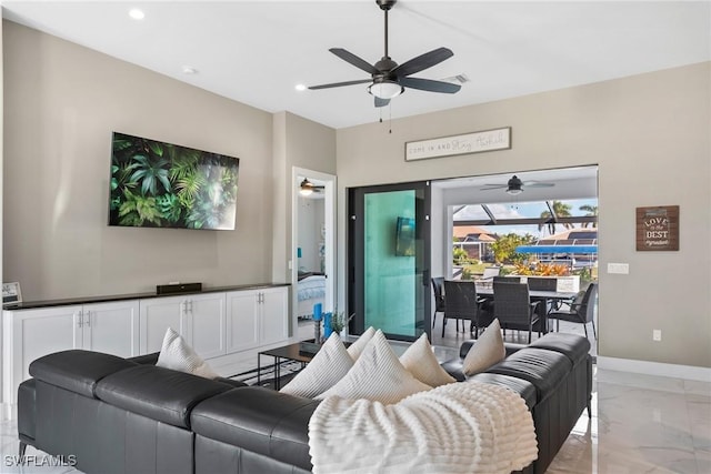 living room with ceiling fan