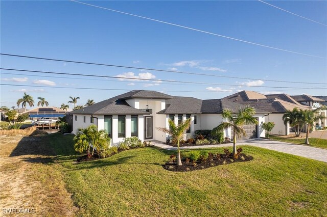 view of front facade with a front yard