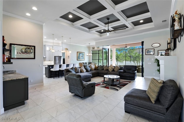 living room featuring a fireplace, ornamental molding, ceiling fan, beam ceiling, and coffered ceiling