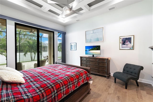 bedroom featuring coffered ceiling, light wood-type flooring, access to exterior, and ceiling fan