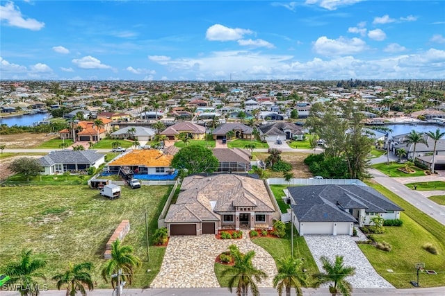 drone / aerial view with a water view