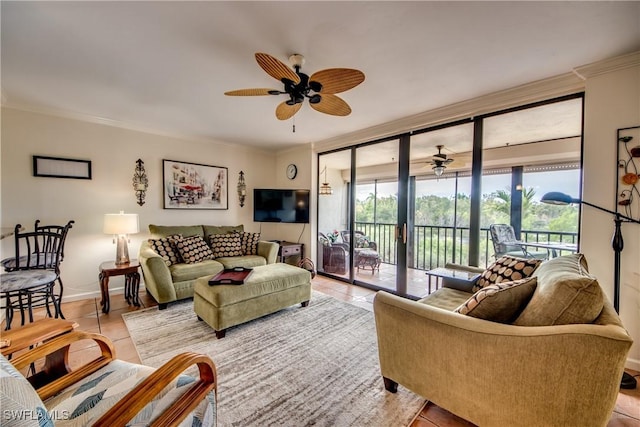 living room featuring plenty of natural light, light tile patterned floors, and crown molding