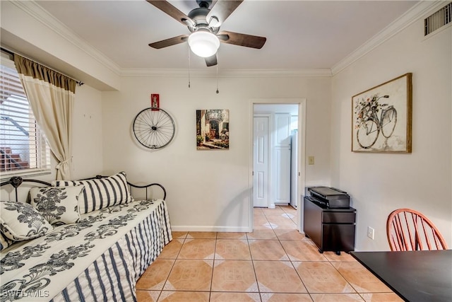 interior space with light tile patterned floors, ceiling fan, and crown molding